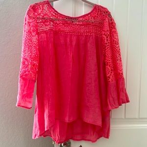 Very pretty top beautiful pink color absolutely gorgeous.